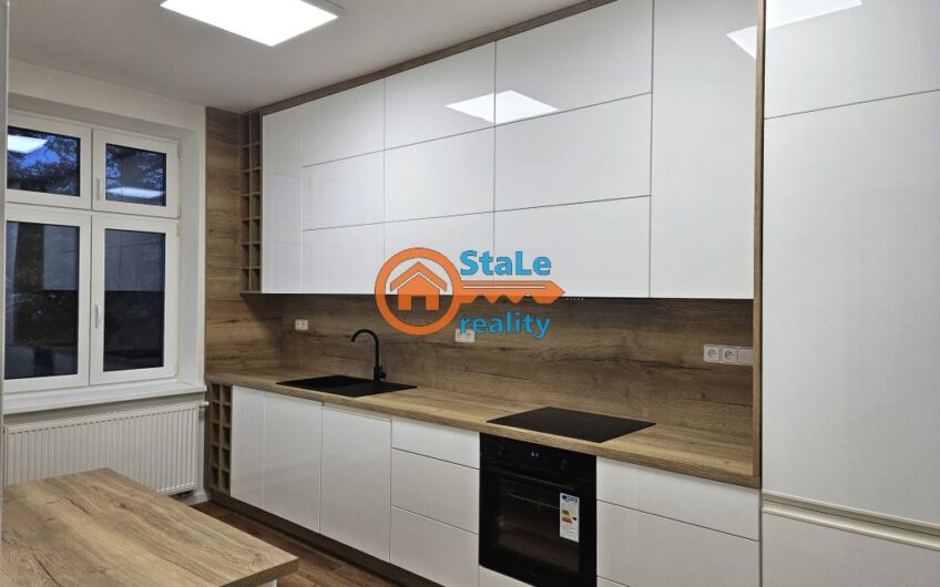 Prodej nadstandardního bytu 3+1 po kompletní rekonstrukci v cihlovém domě 91 m2 se zahrádkou