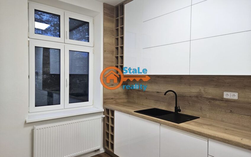 Prodej nadstandardního bytu 3+1 po kompletní rekonstrukci v cihlovém domě 91 m2 se zahrádkou