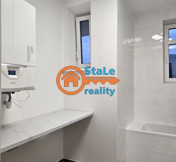 Prodej nadstandardního bytu 3+1 po kompletní rekonstrukci v cihlovém domě 91 m2 se zahrádkou